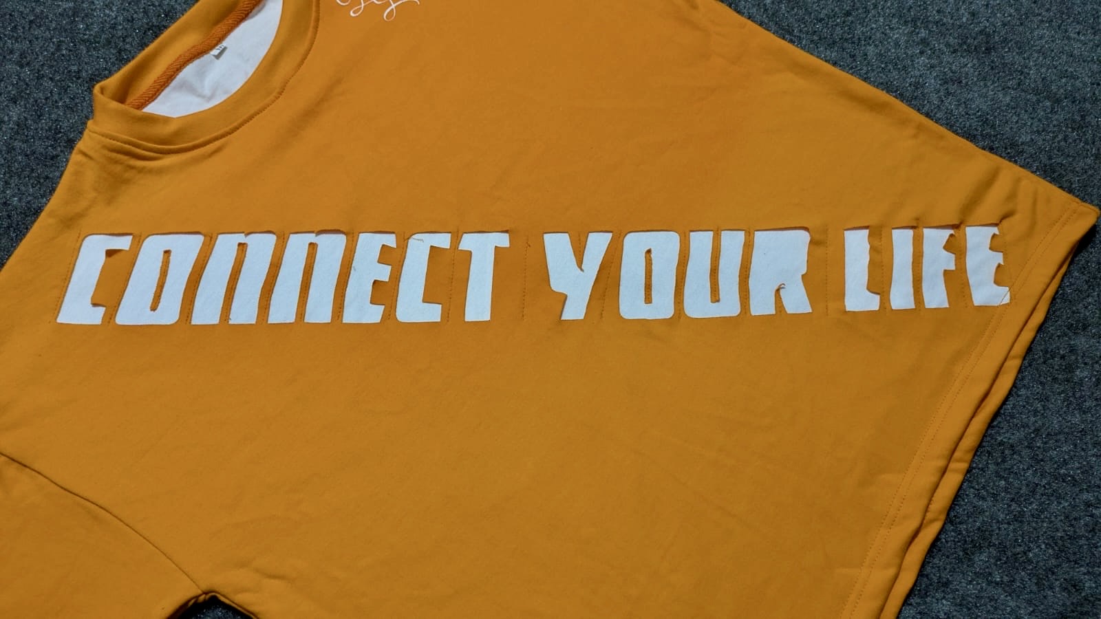 ORANGE TEE